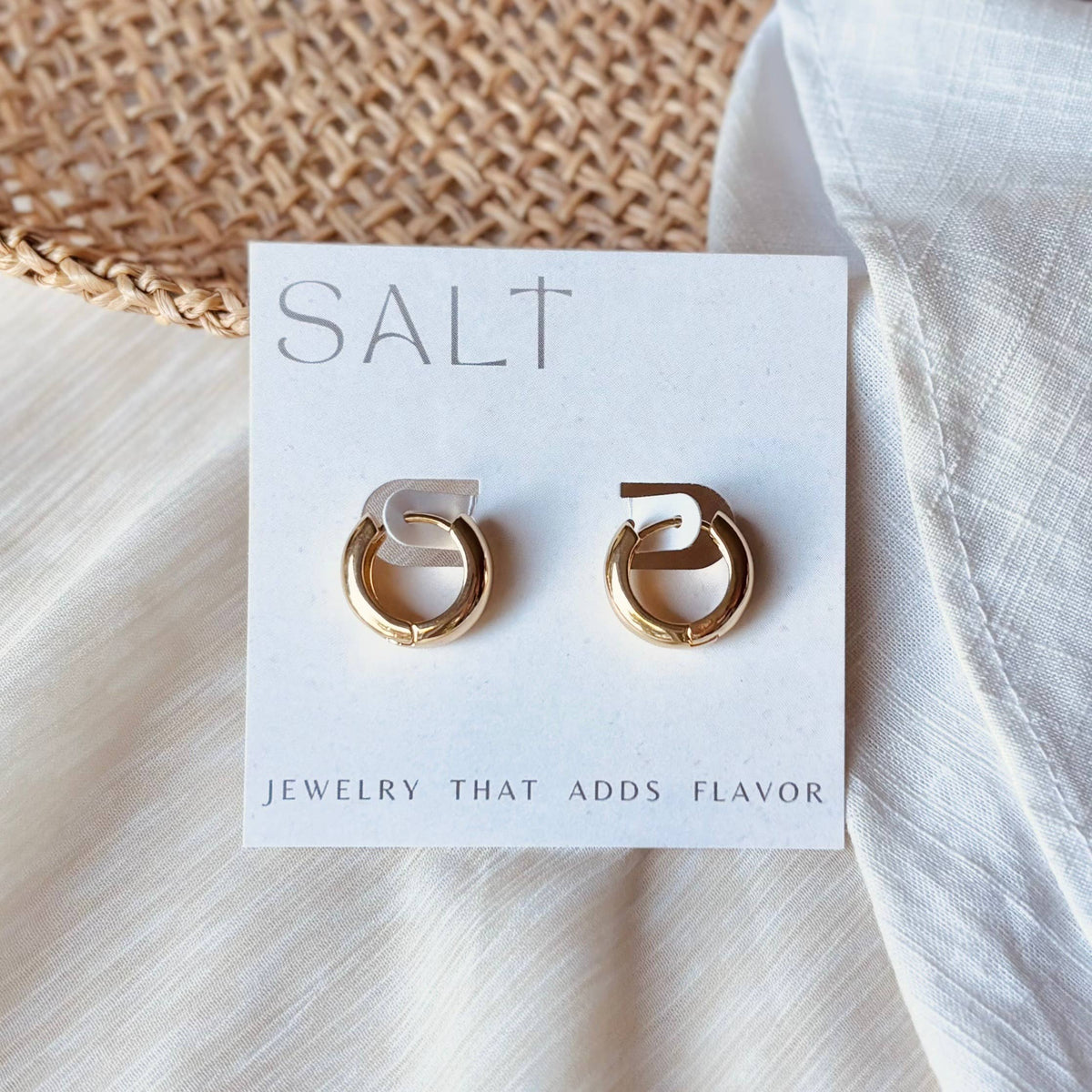 SALT by Sarah Curtis Chubbie Hoops gold earrings on branded display card