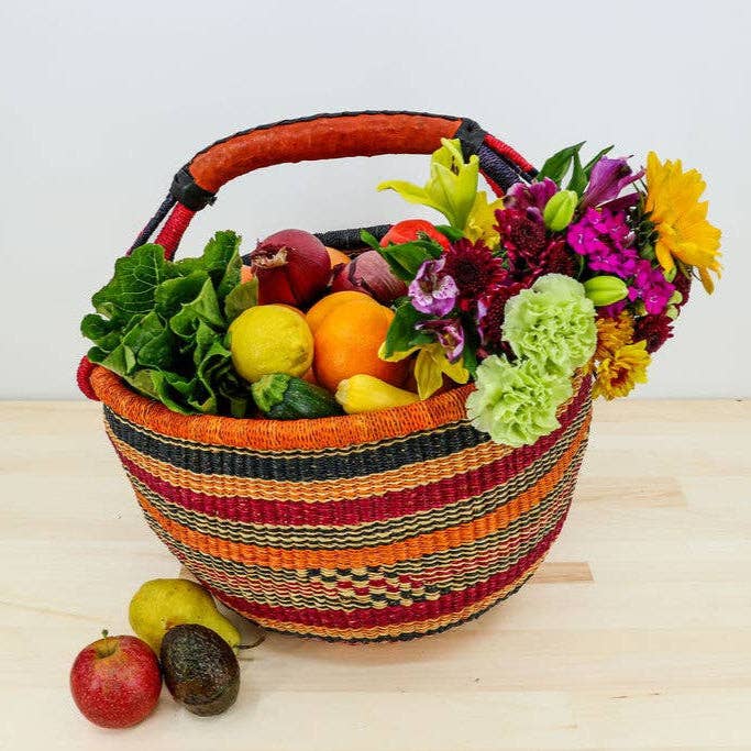 Gitzell FairTrade African Market Basket filled with fresh produce and a colorful flower bouquet