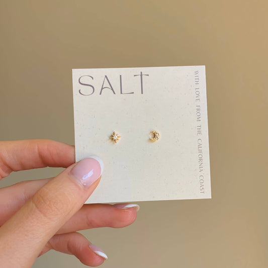 SALT by Sarah Curtis star and moon stud earrings on a branded display card