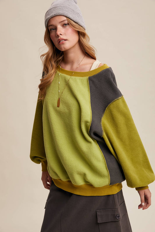 Listicle Colorblock Fleece Pullover LT1111 in olive and charcoal with a grey beanie