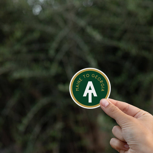 Squatchy Appalachian Trail Maine to Georgia sticker held in hand