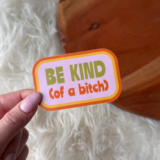 Big Moods Be Kind of a bitch snarky pink sticker with orange border held by hand