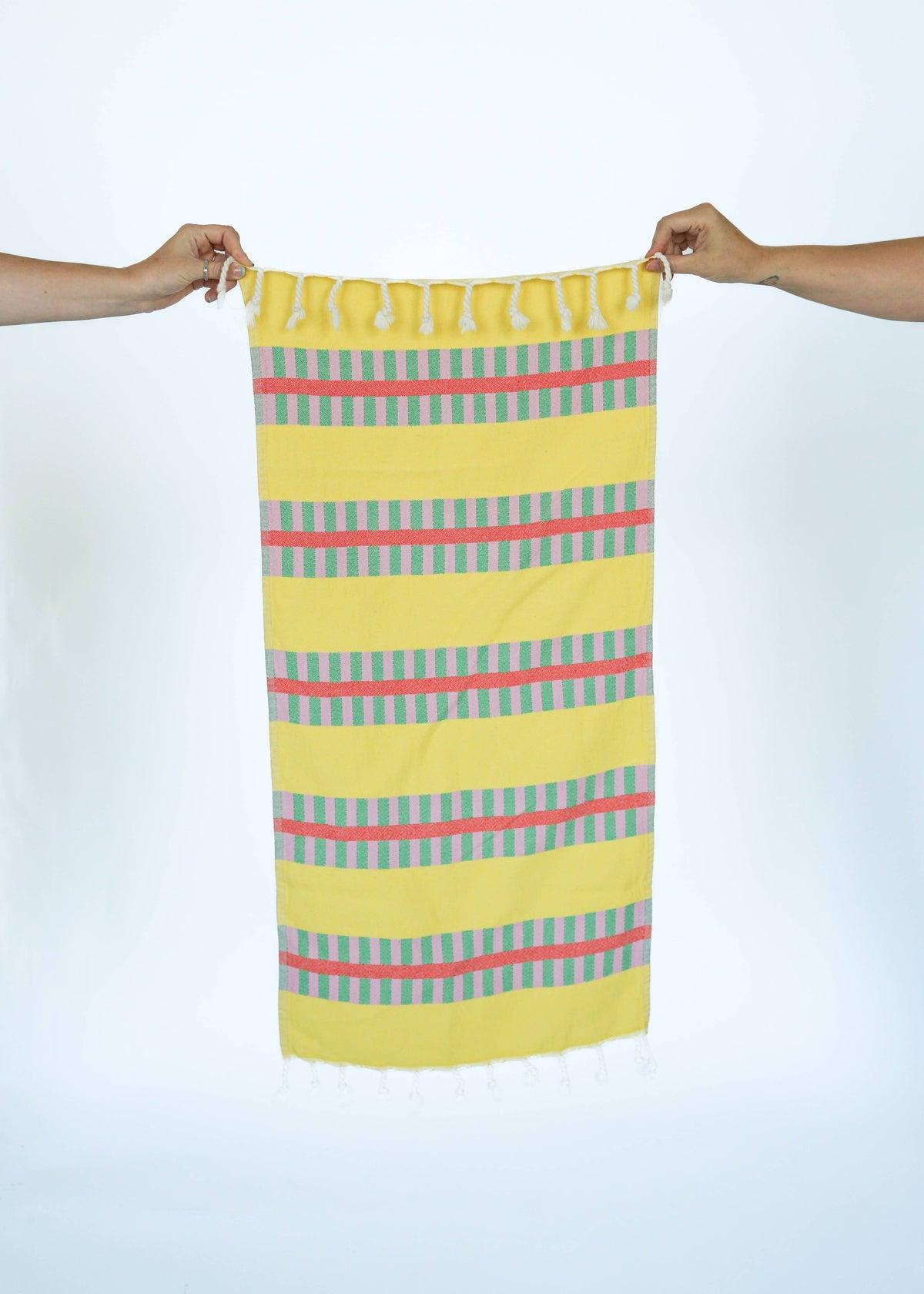 STATE The Label yellow lattice turkish towel in lemon spritz with pink and green striped accents and tasseled edges