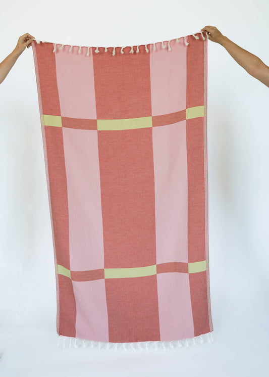 STATE The Label Fence Turkish towel in rose with pink and red block pattern and yellow horizontal stripes