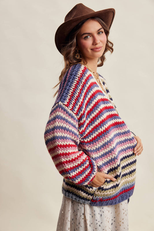 Listicle Ramblin Rose Sweater featuring a multi-colored striped knit pattern and front pockets