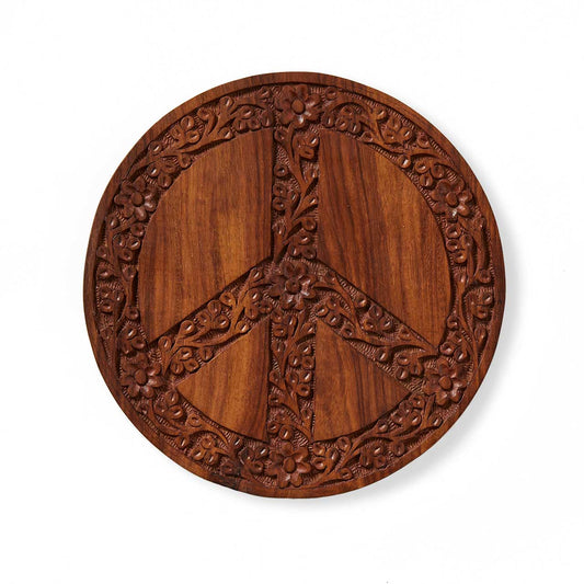 SERRV International Floral Peace Shesham wood trivet with carved flower and vine details