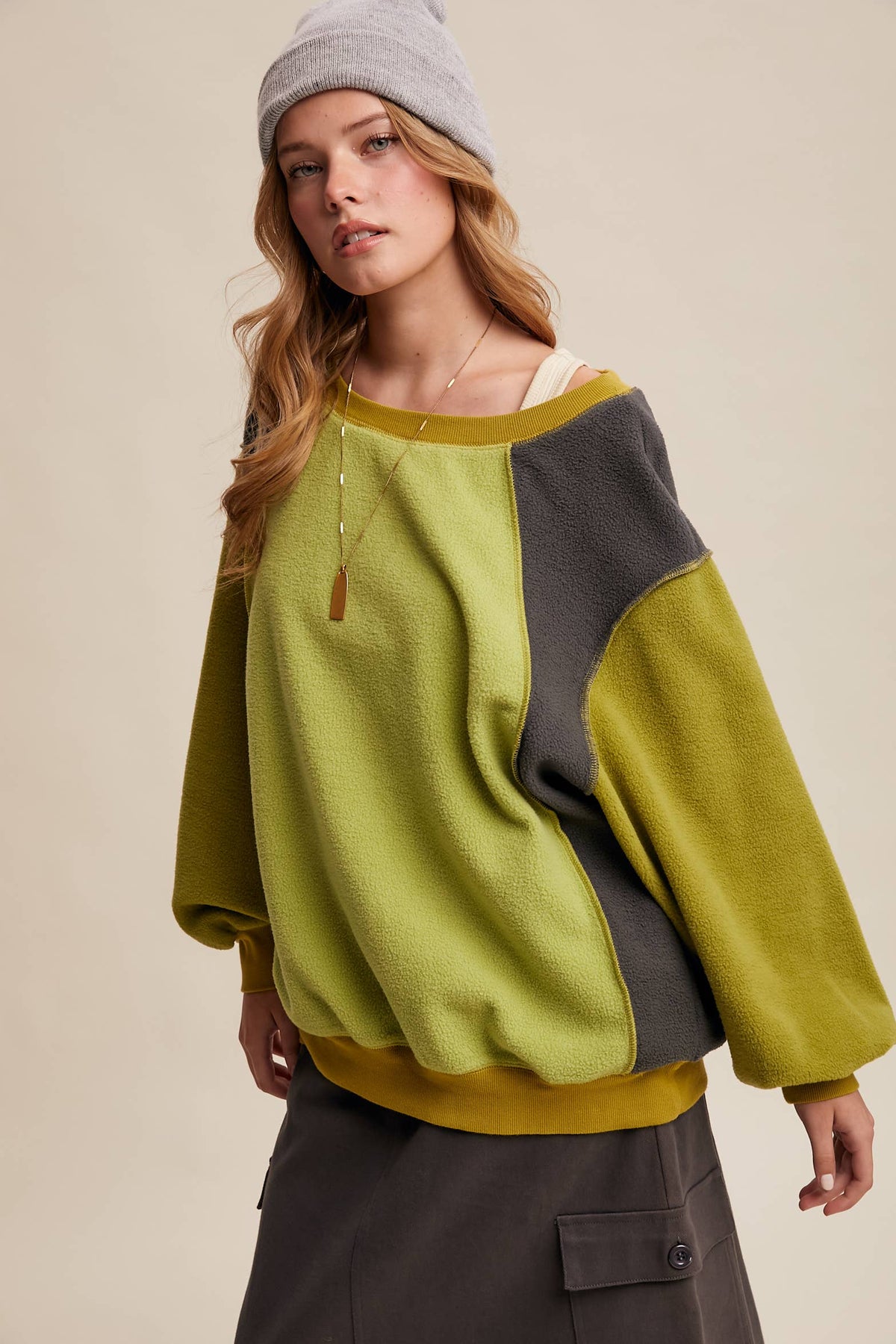 Listicle Colorblock Fleece Pullover LT1111 in olive and charcoal with a grey beanie