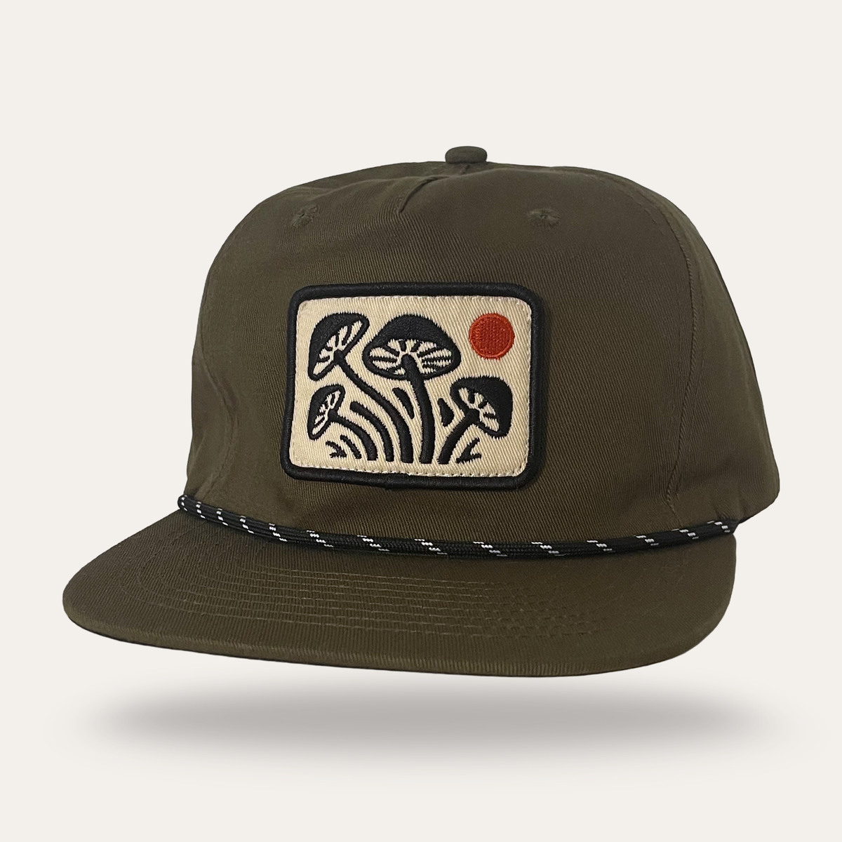 Sunday Lounge forest green cotton twill mushroom hat with a rectangular patch featuring mushroom and sun embroidery