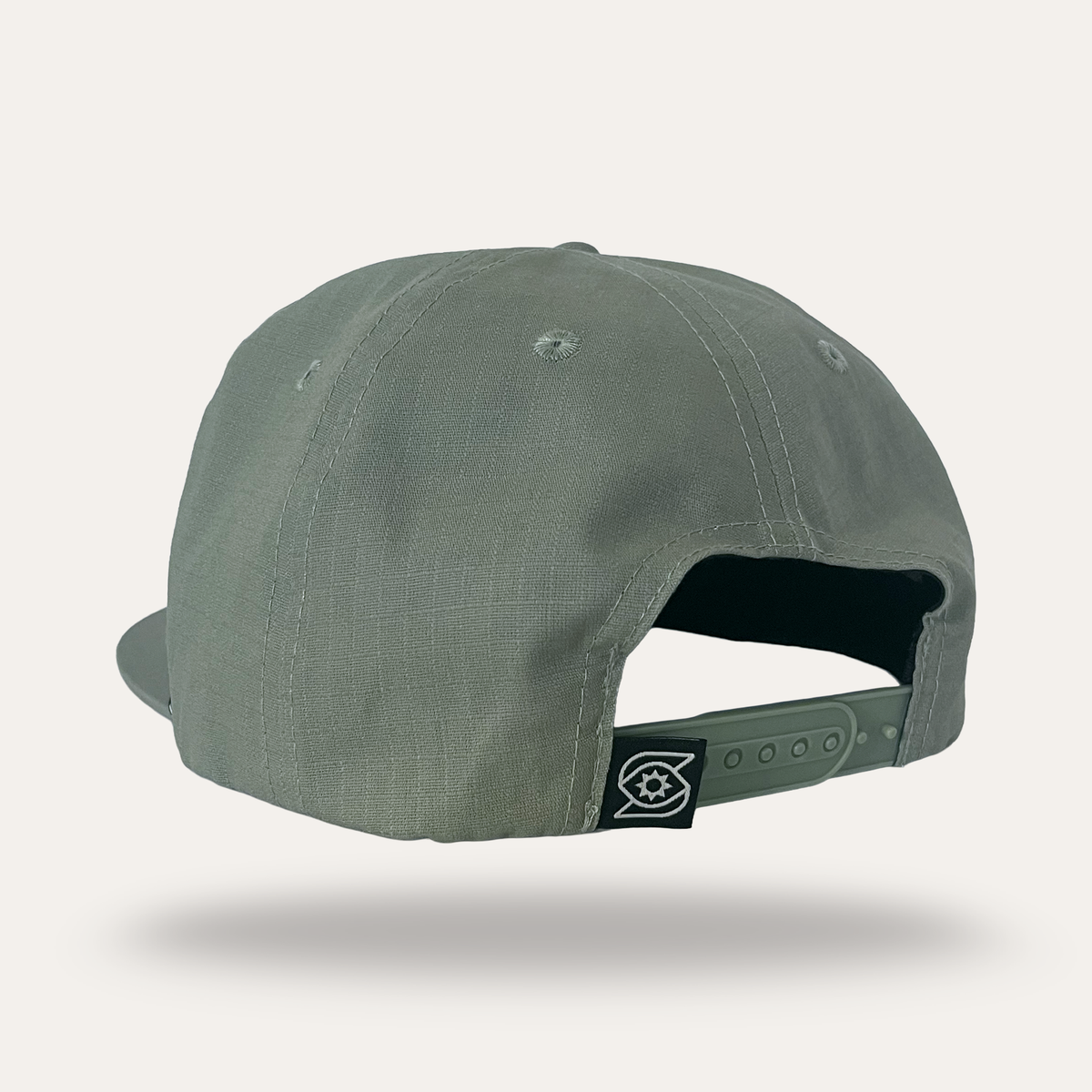 Back view of sage green Sunday Lounge Pelican with Fish Hat in cotton ripstop with adjustable snapback closure