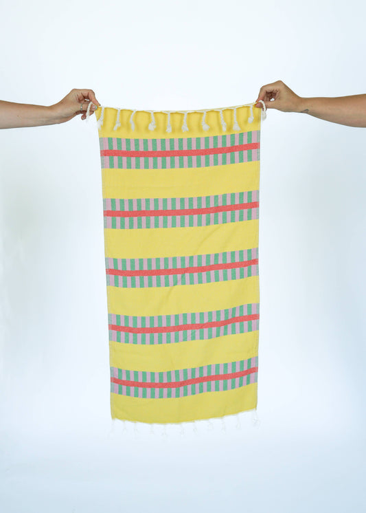 STATE The Label yellow lattice turkish towel in lemon spritz with pink and green striped accents and tasseled edges
