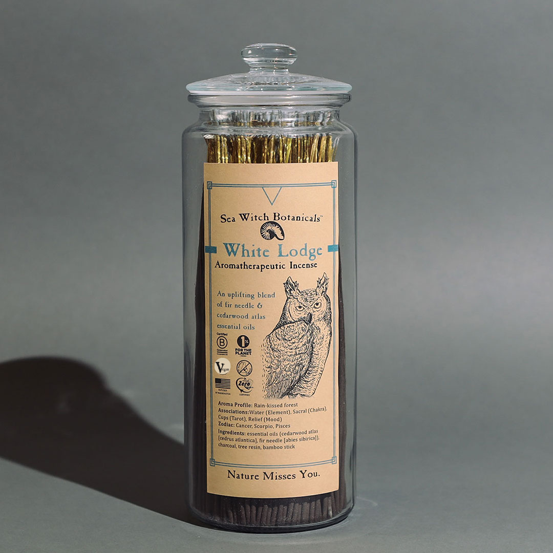 Sea Witch Botanicals White Lodge incense sticks in a glass jar with owl illustration label