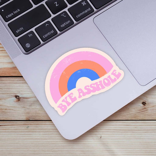 Big Moods Bye Asshole rainbow sticker on a laptop