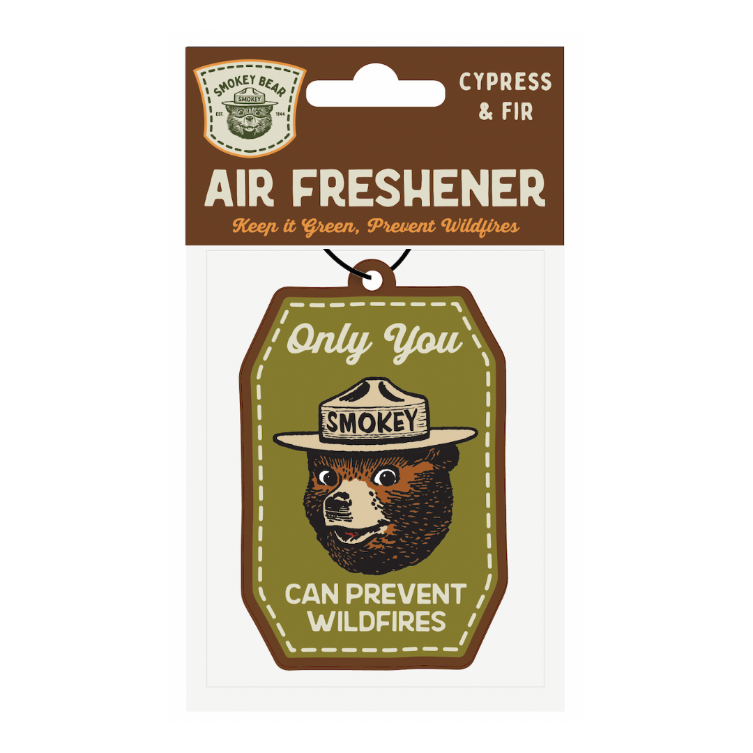 Smokey Bear air freshener with green and brown design on a white background